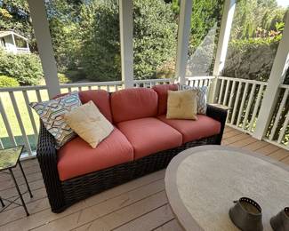 Outdoor sofa with round coffee table