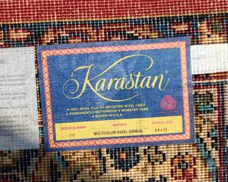 8'8" x 12' Karastan rug with animal damage