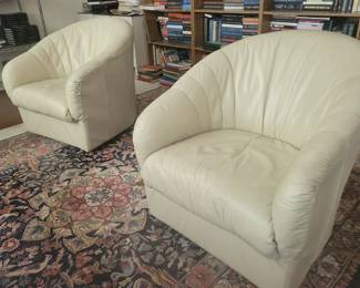 Vintage swivel club chairs