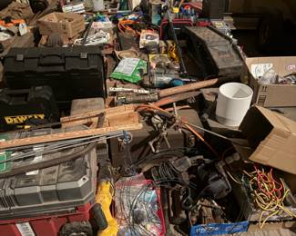 Hay wagons full of tools and garage related items