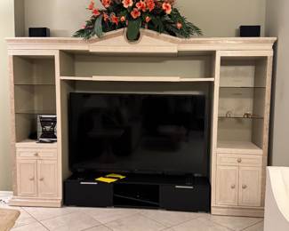 Traditional Solid Wood Entertainment Center, Glass Shelves & Cabinet Storage (Convertible to Two Bookcases)
Beautiful traditional solid wood entertainment center featuring glass display shelves, enclosed cabinet storage, and refined architectural details. Crafted from quality hardwood with a rich finish, this piece offers both display and functional storage.
The unit can also be separated into two matching end bookcases, making it versatile for living rooms, offices, or libraries. Clean, sturdy, and exceptionally well made | a classic, upscale furnishing that elevates any space.