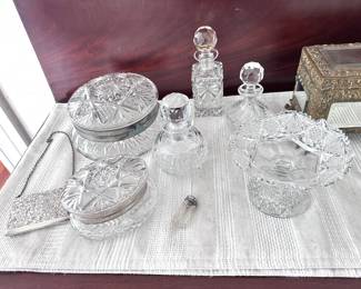 American Brilliant cut glass dresser items with silver cigarette case.