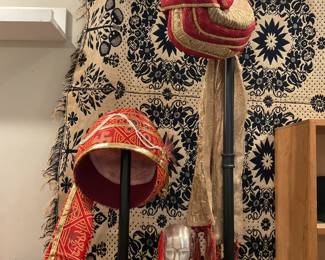 Traditional red and gold safa