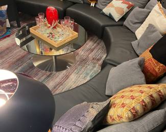 Curved leather and cloth sectional sofa (depth=35” height of seat=14” height of back=30” length of each section=58”) $
