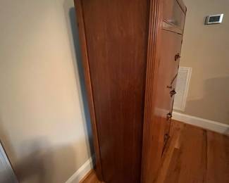E31 - $175. Art Deco Waterfall Wardrobe. Measures 36" wide x 19" deep x 60.25" tall.