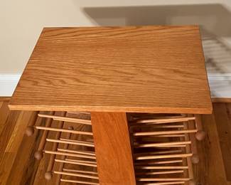 E65 - $25. Magazine Rack. Measures 18.5" x 13" x 23" tall.