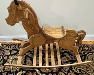 E88 - $50. Wooden Rocking Horse. BIGGER than it looks! Rockers are 45" long. Floor to top of head is 36"