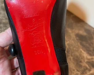 E80 - $120. Christian Louboutin. C'est Moi Black Leather Button Ankle Boots. SIZE 35.5.