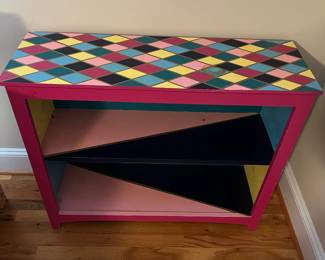 E34 - $75. Painted Bookcase. Measures 36" wide x 12" deep x 30" tall.