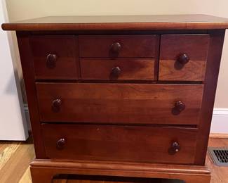 E28 - $75. Stanley Nightstand. Measures 27" wide x 16" deep x 24.25" tall.