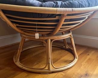 E53 - $40. Papasan Chair with Cushion. Measures 45" round x adjustable heights.