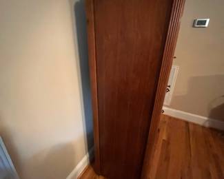 E31 - $175. Art Deco Waterfall Wardrobe. Measures 36" wide x 19" deep x 60.25" tall.