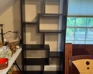 E90 - $50. Shelving Display Unit. Measures 35" wide x 12" deep x 71" tall.