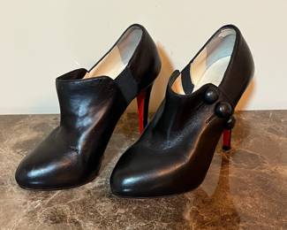 E80 - $120. Christian Louboutin. C'est Moi Black Leather Button Ankle Boots. SIZE 35.5.