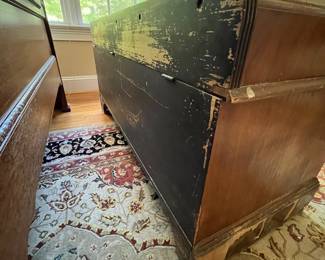 E51 - $50. Roos Cedar Chest. Measures 47" x 19" x 22.5" tall. Cedar on the inside is very nice - veneer needs some repair on the outside.