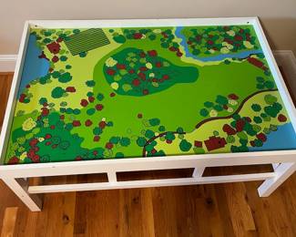 E58 - $50. Train Table. Measures 48.5" x 32.75" x 20.5" tall. It is not double sided.