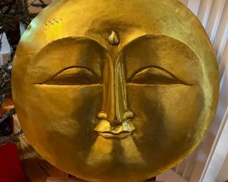 E119 - $50. Gold Wooden Man Face Wall Art. Measures 15.75" round.
