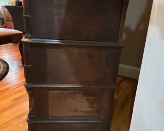 E92 - $550. Eastlake Dresser/ Vanity. Used as Entry Cabinet. Measures 50" wide x 20" deep x 98" tall. This is right inside the front door but you need to plan for help to move. Veneer is peeling but actually looks intentional in person.