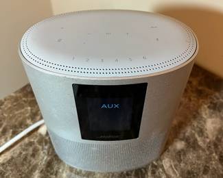 E95 - $175. Bose Home Speaker 500 with screen.