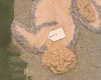E52 - $50. Pottery Barn Kids Area Rug. Measures 60". Needs cleaned.