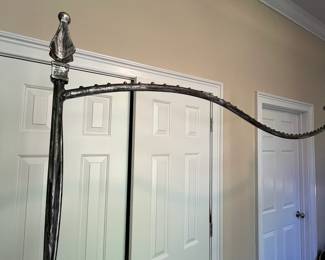 E24 - $150. Fancy - Sturdy Garment Rack. Solid metal. Does NOT come apart. You will need a truck to transport. The tallest part is 77" x 6' long.