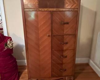 E31 - $175. Art Deco Waterfall Wardrobe. Measures 36" wide x 19" deep x 60.25" tall.