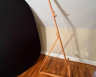 E64 - $40. Adjustable Wooden Floor Easel. Measures 24.75 x 72" tall.