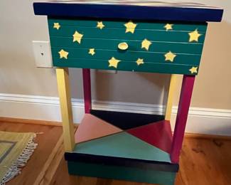 E33 - $60. Single Painted Nightstand. Measures 18" wide x 13" deep x 24.5" tall.