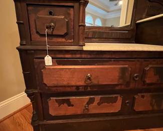E92 - $550. Eastlake Dresser/ Vanity. Used as Entry Cabinet. Measures 50" wide x 20" deep x 98" tall. This is right inside the front door but you need to plan for help to move. Veneer is peeling but actually looks intentional in person.