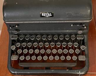 E59 - $75. Royal Typewriter. KMM Model I believe. All keys move.