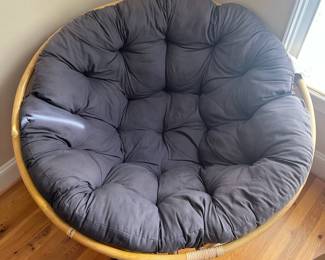 E53 - $40. Papasan Chair with Cushion. Measures 45" round x adjustable heights.