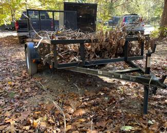 G27 - $1200. 5.5 x 10' Flat Trailer.