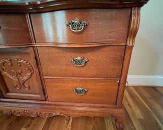 E23 - $250. Lexington Dresser with Mirror. Measures 64" x 21" x 34" tall. Mirror is 48" x 48". Pull for cabinet, bottom middle, needs a new screw.