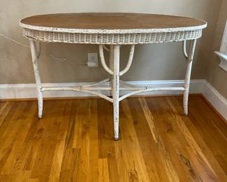 E1 - $125. Oval Wicker Wooden Top Dresser. Measures 48" x 24.5" x 30.5" tall.