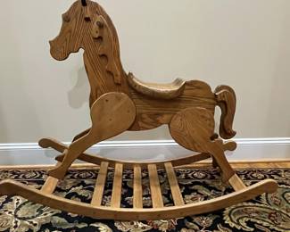 E88 - $50. Wooden Rocking Horse. BIGGER than it looks! Rockers are 45" long. Floor to top of head is 36"