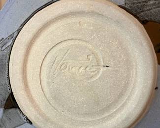 E99 - $100. Set of 8 "HOWE" Pottery Dinner Plates. Measures 8.5" across.