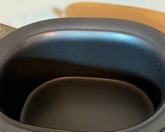 E117 - $100. All Clad Crock Pot. Lid has a dent on the rim - see photo.