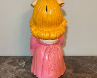 E71 - $50. 1980 A to Z Productions Miss Piggy Bank. (Hole for rubber seal was never cut out.) Measures 8.25" x 17" tall.