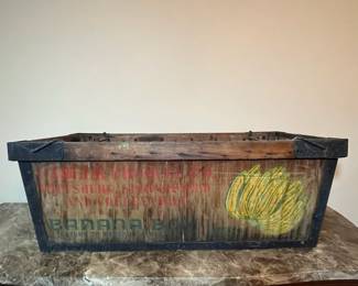 E107 - $75. Banana Crate. Measures 34.5" long x 16" wide x 13" tall.