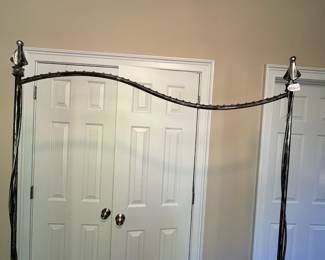 E24 - $150. Fancy - Sturdy Garment Rack. Solid metal. Does NOT come apart. You will need a truck to transport. The tallest part is 77" x 6' long.