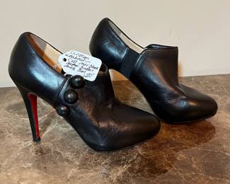 E80 - $120. Christian Louboutin. C'est Moi Black Leather Button Ankle Boots. SIZE 35.5.