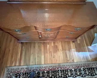 E23 - $250. Lexington Dresser with Mirror. Measures 64" x 21" x 34" tall. Mirror is 48" x 48". Pull for cabinet, bottom middle, needs a new screw.