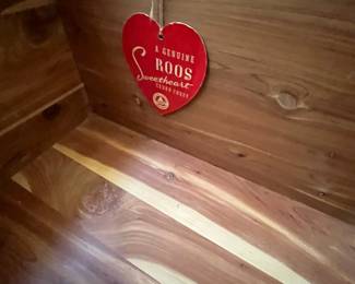 E51 - $50. Roos Cedar Chest. Measures 47" x 19" x 22.5" tall. Cedar on the inside is very nice - veneer needs some repair on the outside.