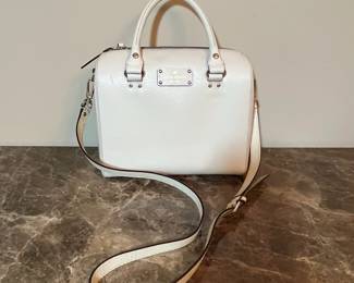 E77 - $65. Kate Spade Ivory Wellesley Alessa Blue. Measures 10" x 8.5" x 4".