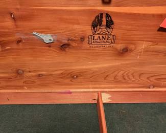 E32 - $75. Painted Lane Cedar Chest. Measures 47" wide x 17.5" deep x 19" tall.