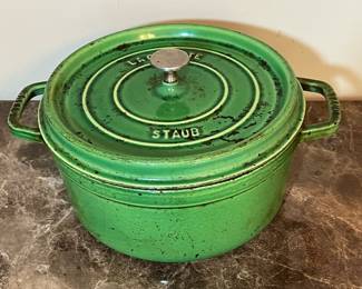 E70 - $50. Staub #26. 10 1/4" Dutch Oven. Needs cleaning.