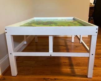 E58 - $50. Train Table. Measures 48.5" x 32.75" x 20.5" tall. It is not double sided.