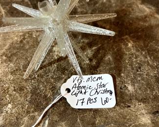 E123 - $60 for 17. 2 sets available. Vintage MCM Atomic Star Christmas Lights.
