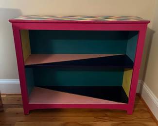 E34 - $75. Painted Bookcase. Measures 36" wide x 12" deep x 30" tall.