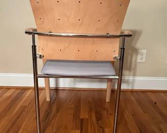 E67 - $60. Dauphin Enzo Chair. Measures 23.5" wide x 18.5" floor to seat x 33" tall.
